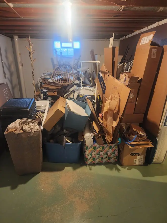 Roll-off dumpster container at job site for Construction Dumpster Rental in Kings Park